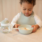 Bavetta in silicone Verde 108034565399 corredino e abbigliamento neonato | NANU' BABY