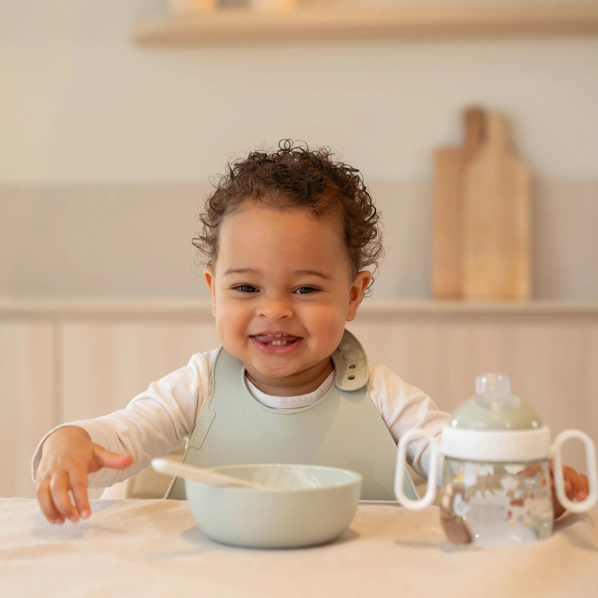 Bavetta in silicone Verde 108034565399 corredino e abbigliamento neonato | NANU' BABY