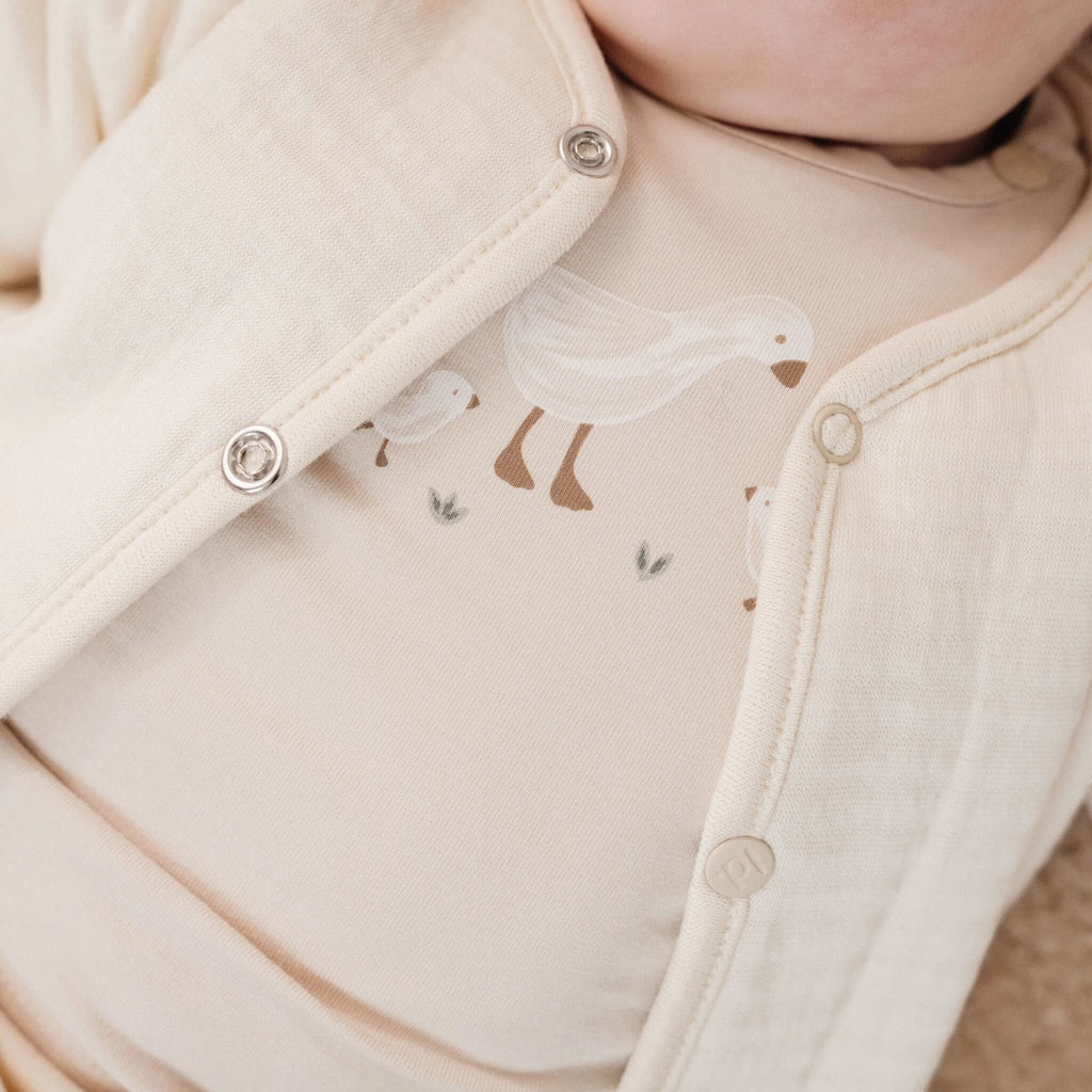 Ivory Long-Sleeve Baby T-Shirt CL25291001